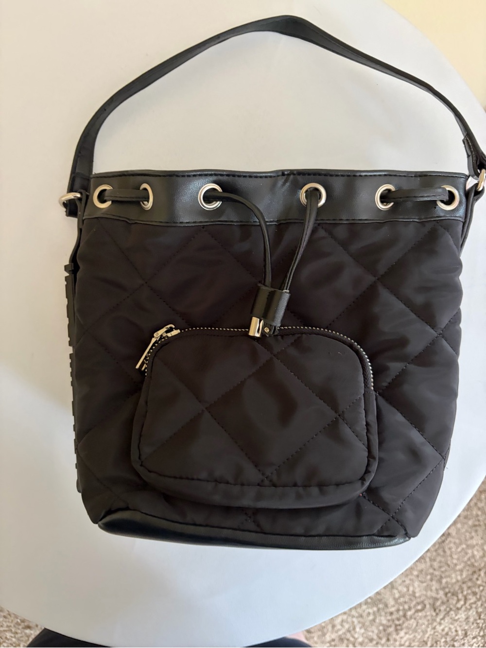 Steve Madden Quilted Black Drawstring Shoulder Bag with Front Zip Pocket